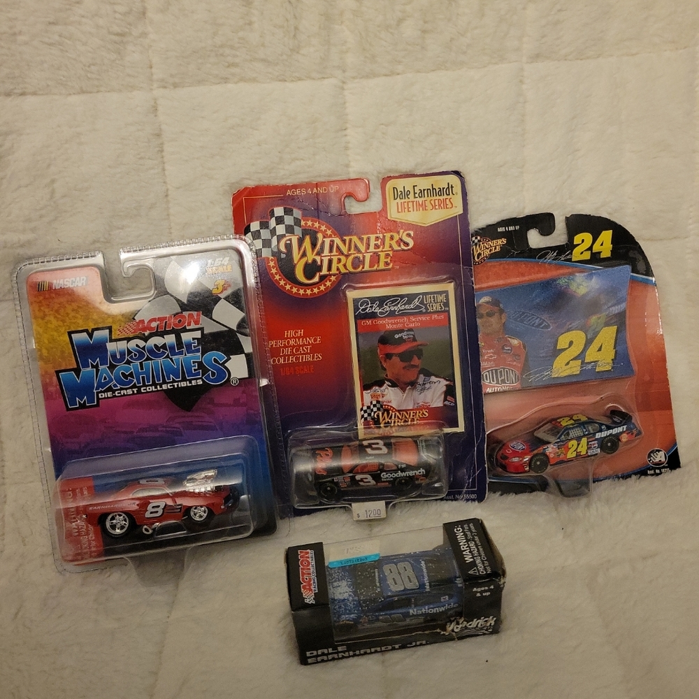 Toys Car Winners circle Die Cast Collectibles 1/64 scale lot of 4 racing cars.